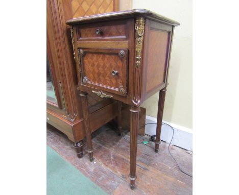 A good quality 19th century French lamp or bedside table, the parquetry door enclosing a marble lined chamber with shallow fr