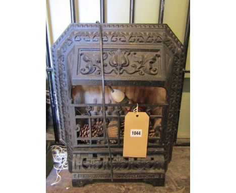 A small vintage cast iron heater with decorative foliate, geometric and bead work detail, stamped The Imperial Stove Company,