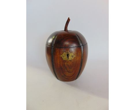 Antique style carved oak melon tea caddy, with hinged lid, 15cm high