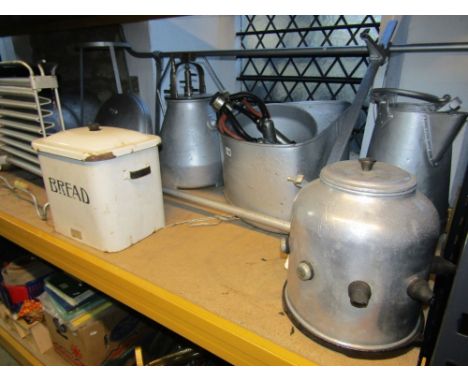 One lot of vintage milking parlour related items to include a Descu milk cooler and corner stand, various churns, calf feeder