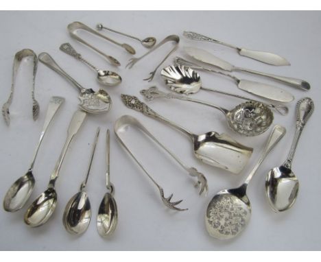 A collection of good silver flatware to include four silver sugar nips, silver sugar shovel, sifter spoon and others, 10.5oz 