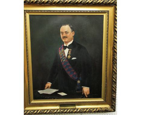 An oil painting on canvas, half length portrait of a gentleman wearing the sash of the Royal Ancient Order of Buffaloes, sign