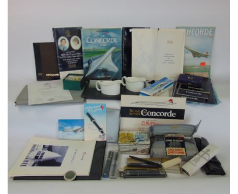 A box containing a collection of Concorde memorabilia to include playing cards, books, pens, etc; together with further Briti