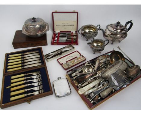 A large collection of silver plate to include a good heavy part tea set embossed with scrolled acanthus and cartouche, variou