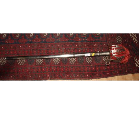 A 20th Century ceremonial sword with twin fullered etched blade, basket hilt and steel scabbard, blade 32" long