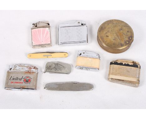 A silver and pink enamel cased cigarette lighter, a number of other lighters, a brass tobacco box and three pocket knives