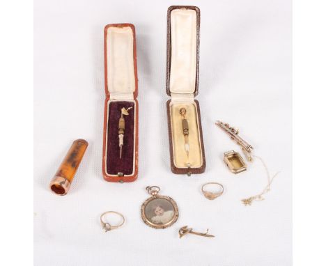 Two gold mounted stick pins, an amber and gold mounted cheroot holder and other items of gold jewellery, various