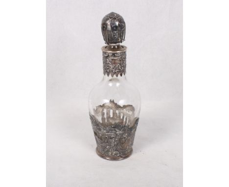 A continental silver mounted miniature decanter, London import marks