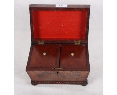 A William IV mahogany sarcophagus-shaped two-division tea caddy, 8" wide