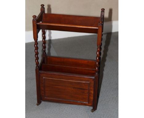 A polished as mahogany magazine trough fitted castors and book trough over, 18" wide