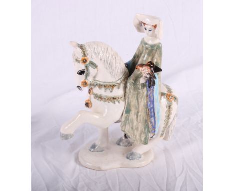 A floral decorated ceramic vase lamp base with ornate gilt metal mounts, a Cotswold Pottery equestrian figure of a lady with 