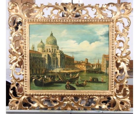 A 19th Century oil on panel, Venetian view, 9 1/2" x 11 1/2", in ornate carved giltwood leaf decorated frame