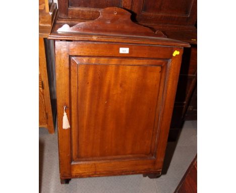 A 19th Century mahogany hanging wall cupboard enclosed panel door, 24" wide