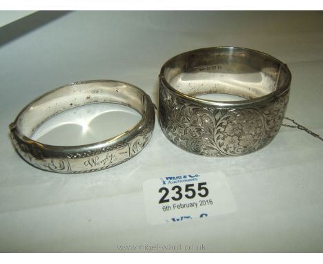 A wide Silver Bangle and a Silver Bangle with the name 'Wendy'