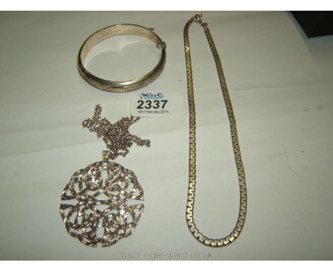 A Silver Pendant and chain, Silver Bangle and a Silver Necklace