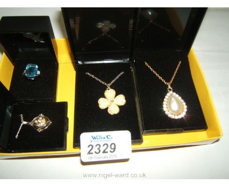 A quantity of boxed Costume Jewellery including gold coloured mother of pearl four leaf clover Necklace, gold coloured pearl 