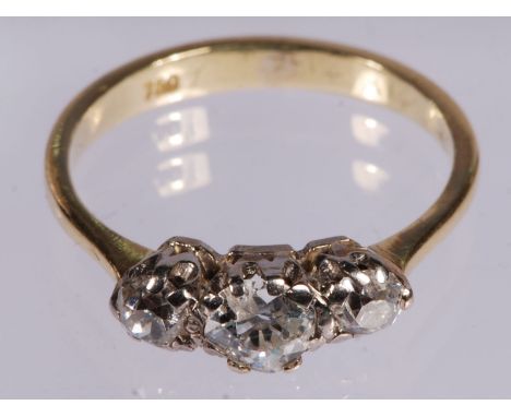 An 18ct yellow Gold platinum set three stone Diamond Ring with valuation certificate.