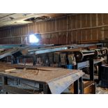 Breakdown hoist with infeed and out feed system (located Chop Saw Building) All items sold subject