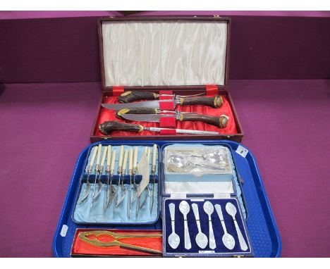 A Cooper Brothers &amp; Sons Five Piece Carving Set, in original fitted case, a cased set of twelve fish knives and forks wit