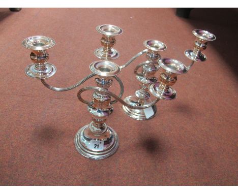 A Pair of Antique Style Silver Plate on Copper Twin Branch Candelabra, (converting to a pair of dwarf candlesticks). (2)