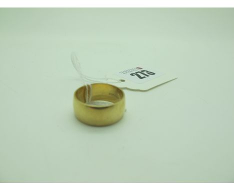 A Wide Plain Wedding Band, stamped "375" (finger size R) (6.2grams). 