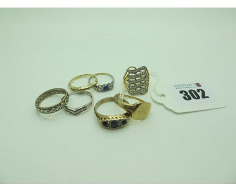 A Signet Style Ring, (damaged), an eternity band, modern gilt ring stamped "925", etc. (7) 