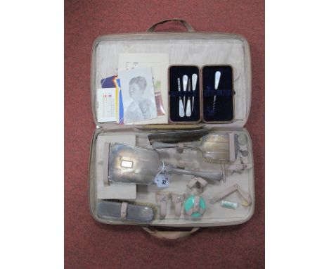 A Hallmarked Silver Backed Travelling Set, the brushed and hand mirror with engine turned decoration, in fitted case (incompl