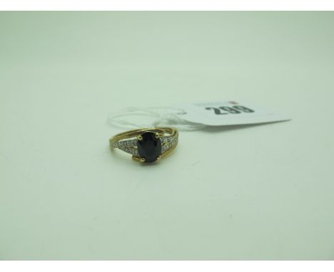 A Modern Diamond Set Dress Ring, oval four claw set to the centre, between inset shoulders, stamped "375" "DIA" (finger size 