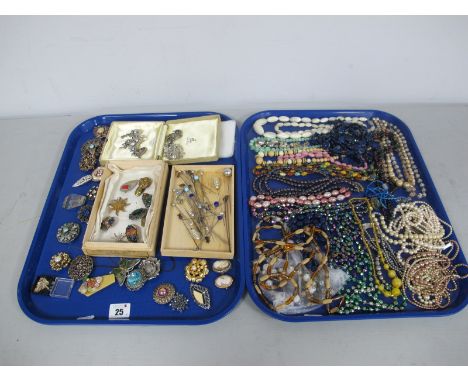 Assorted Costume Jewellery, including brooches, hat pins, imitation pearls and assorted bead necklaces, highly decorative mar