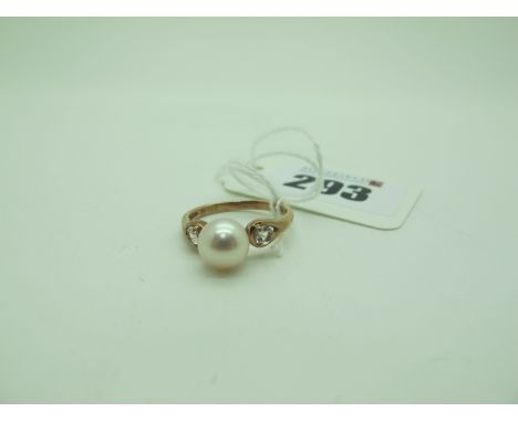 A QVC Modern 9ct Rose Gold Pearl Dress Ring, between inset shoulders (finger size M1/2) (2.1grams). 