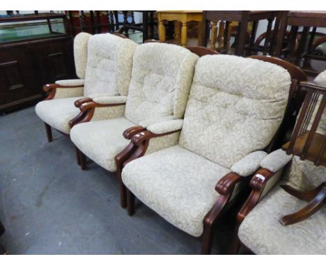 A SET OF THREE ERCOL STYLE ELM FIRESIDE ARMCHAIRS, UPHOLSTERED AND COVERED IN LEAF SCROLL EMBOSSED MUSHROOM COLOUR FABRIC  