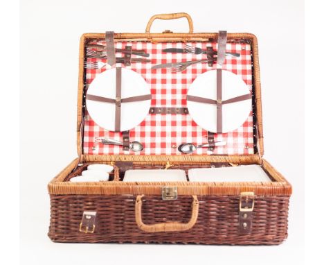 IKEA OBLONG WICKER PIC-NIC HAMPER FOR FOUR PERSONS, with leather fittings, together with a SET OF THREE CIRCULAR, STACKING BA