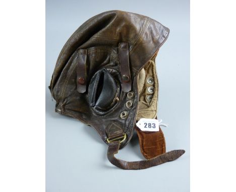 A WWII pilot's helmet, type C, probably 1942 pattern, in good condition with original straps