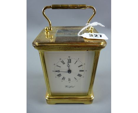 A modern brass encased non-striking carriage clock with presentation plate for 1993