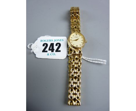 A lady's yellow metal and stainless steel oval dial Rotary wristwatch with incorporated woven style bracelet