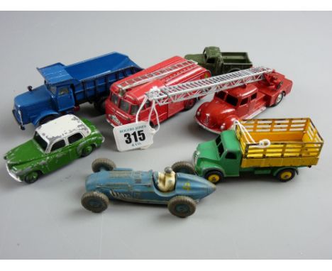 Seven Marklin and Dinky diecast vehicles including a Marklin fire engine no. 8023 'Made in Western Germany', a Marklin dumper