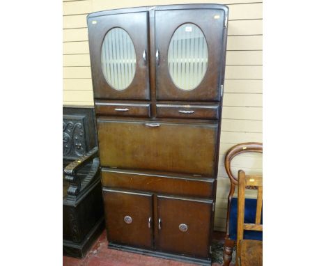 A Shefco vintage oak effect kitchen cabinet with drop down enamel preparation tray, circa 1960s, in original livery, 178 x 84