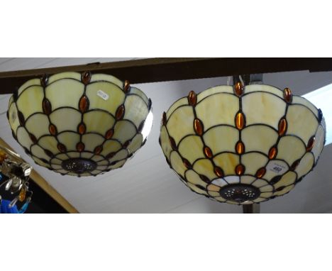 A pair of ceiling light bowls, with inset orange glass 