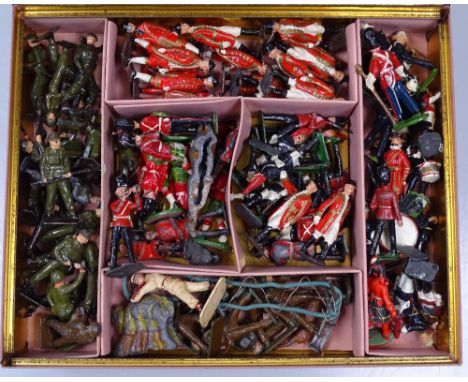 A tin of Vintage lead diecast soldiers etc 
