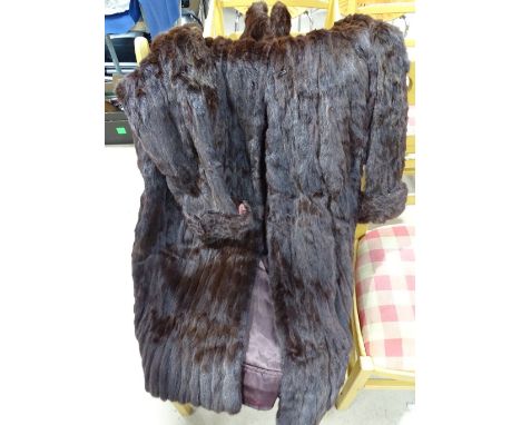 A Vintage full length fur coat 