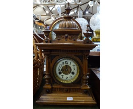 A Gothic design 2-train mantel clock with brass and enamelled dial, height 17.5" 
