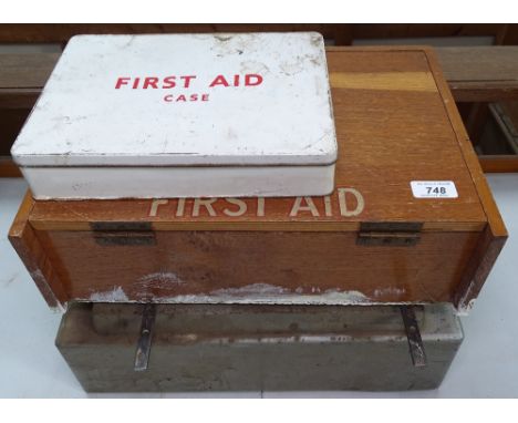 A Vintage First Aid tin and cabinet, and a Vintage till 