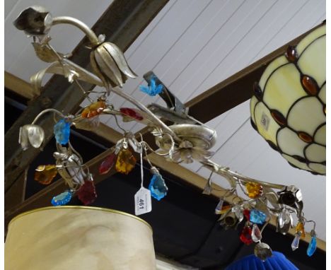 A ceiling light with coloured glass drops 