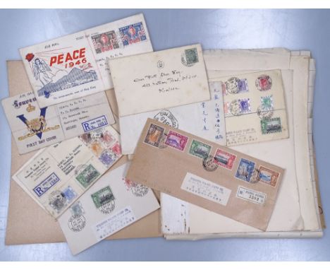 A folder of stamps, including Mint Hong Kong, Peace 1946 Hong Kong First Day Cover etc 