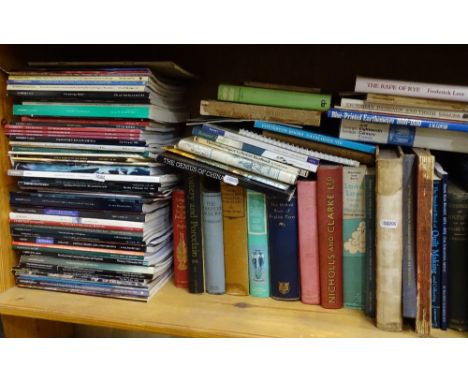 A shelf full of Antique's reference books, catalogues etc 