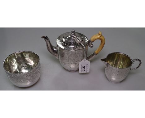 A Victorian engraved silver batchelor's tea set, teapot having ivory handle, hallmarks for London 1886 and 1893, maker's mark