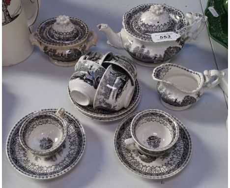 A Victorian black and white printed doll's tea service, in peacock pattern 
