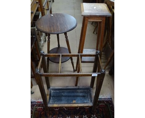 A 1920s oak stick stand, a jardiniere stand, and an occasional table (3) 