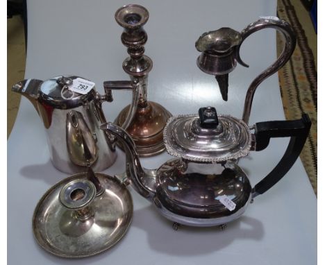 A silver plate on copper candlestick, a Viners plated coffee pot, a plated chamber stick 