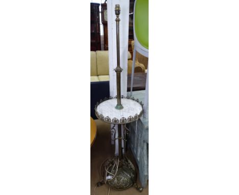 A brass telescopic standard lamp, converted to electric, with marble top 